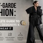 Avant-garde fashion editorial featuring a model in a sculptural black outfit, showcasing bold silhouettes, innovative design, and wearable art.