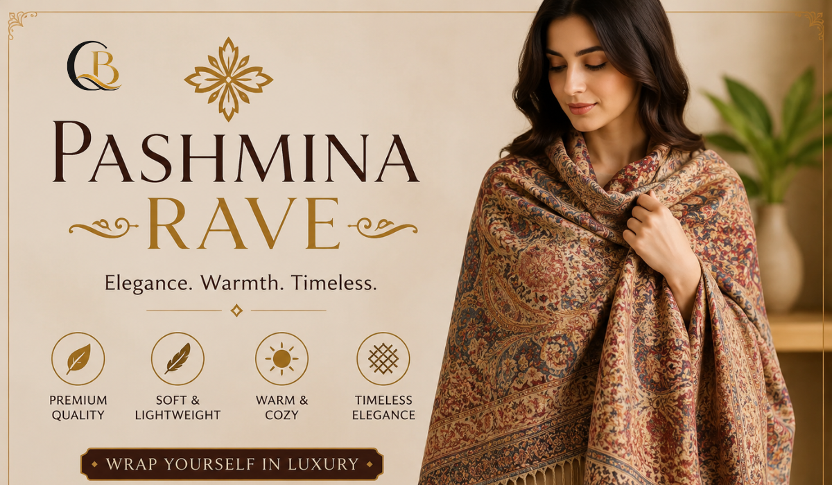 Elegant woman wearing a luxurious paisley pashmina shawl with the text “Pashmina Rave” and “Elegance. Warmth. Timeless.”